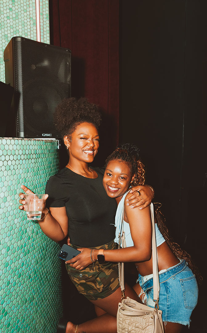 Champagne Sundays two friends posing